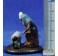 Pastora hilandera con gato 5 cm barro pintado Figuralia
