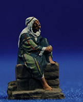 Pastor joven sentado en un muro 3 cm pasta cerámica Hermanos Cerrada