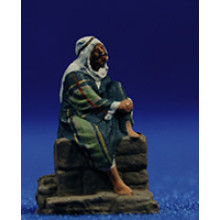 Pastor joven sentado en un muro 3 cm pasta cerámica Hermanos Cerrada