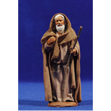 Pastor que se cubre 10 cm ropa y barro Pastor que se cubre 10 cm ropa y barro