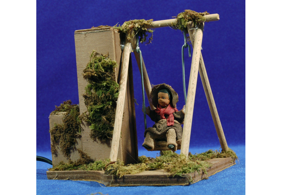 Niño con columpio movimiento 12 cm barro pintado
