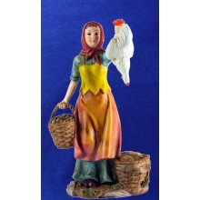 Pastora vendedora con gallina y cestos 25 cm resina