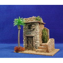 Casa con escalera con palmera 19x15x18 cm corcho yeso plastico